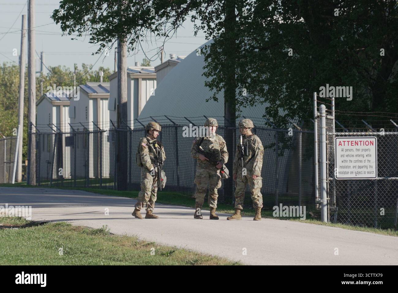 Military personnel in uniform, with the Texas National Guard patch on ...