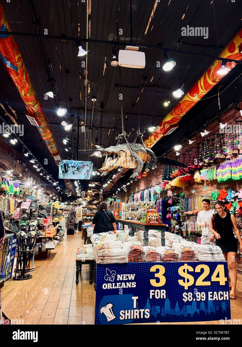 Souvenir shop interior with hanging alligator decoration in New Orleans - Smartphone Captured Stock Image