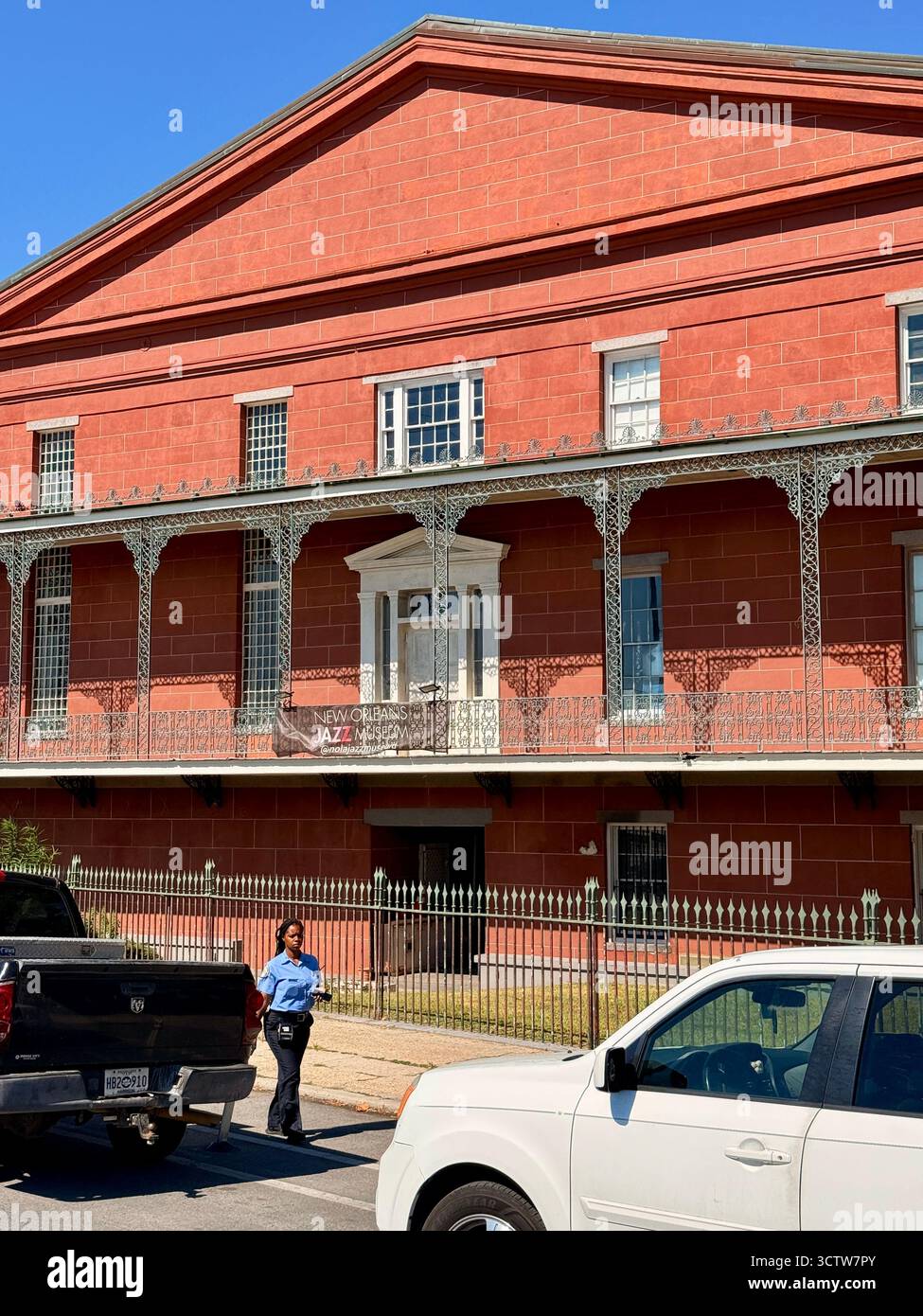New Orleans Jazz Museum building with wrought iron balconies - Smartphone Captured Stock Image
