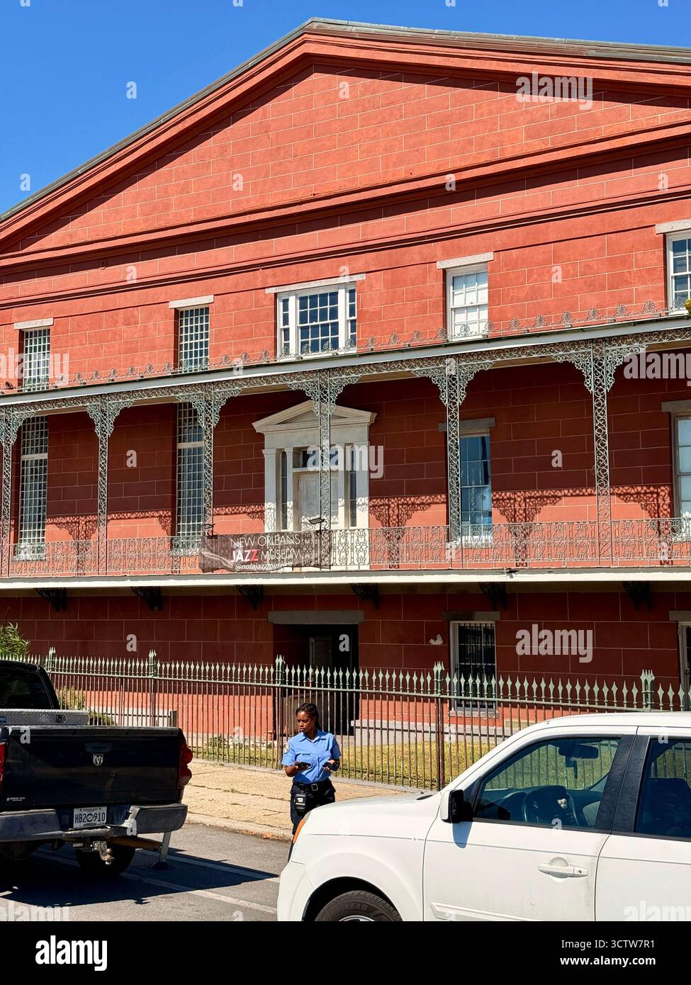 New Orleans Jazz Museum building with wrought iron balconies - Smartphone Captured Stock Image