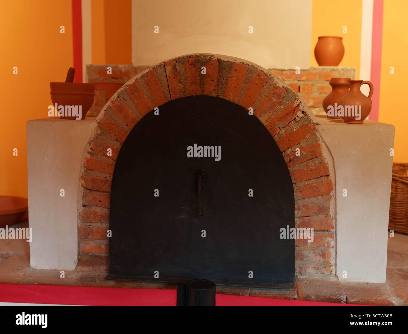 Traditional Brick Oven with Clay Vessels Stock Photo