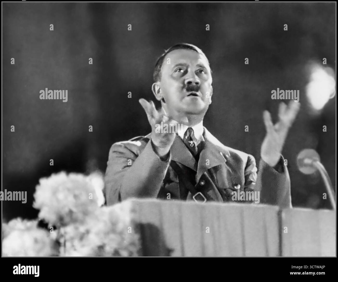 Adolf Hitler On A Podium Giving An Animated Speech Gesturing With His Adolf Hitler On A Podium Giving An Animated Speech Gesturing With His