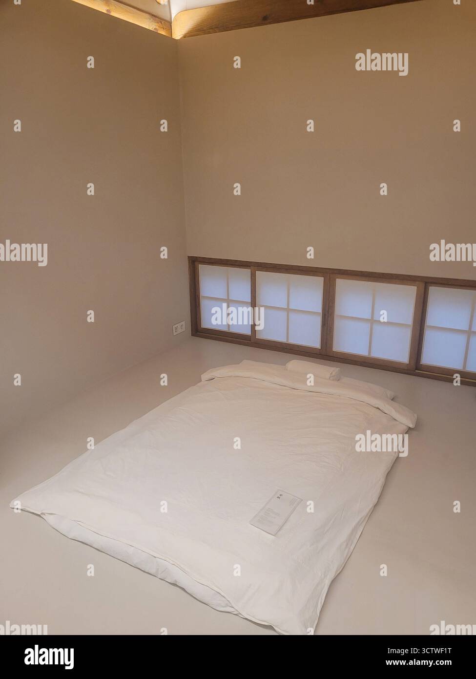 A photograph of a minimalist interior bedroom in a traditional Korean ...