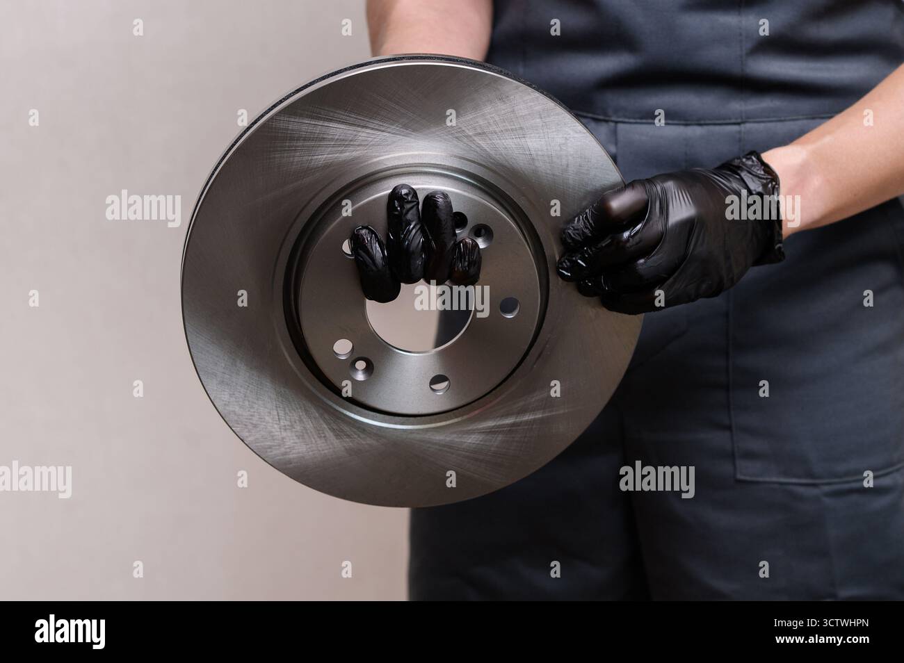 Auto mechanic holding new hi res stock photography and images Alamy
