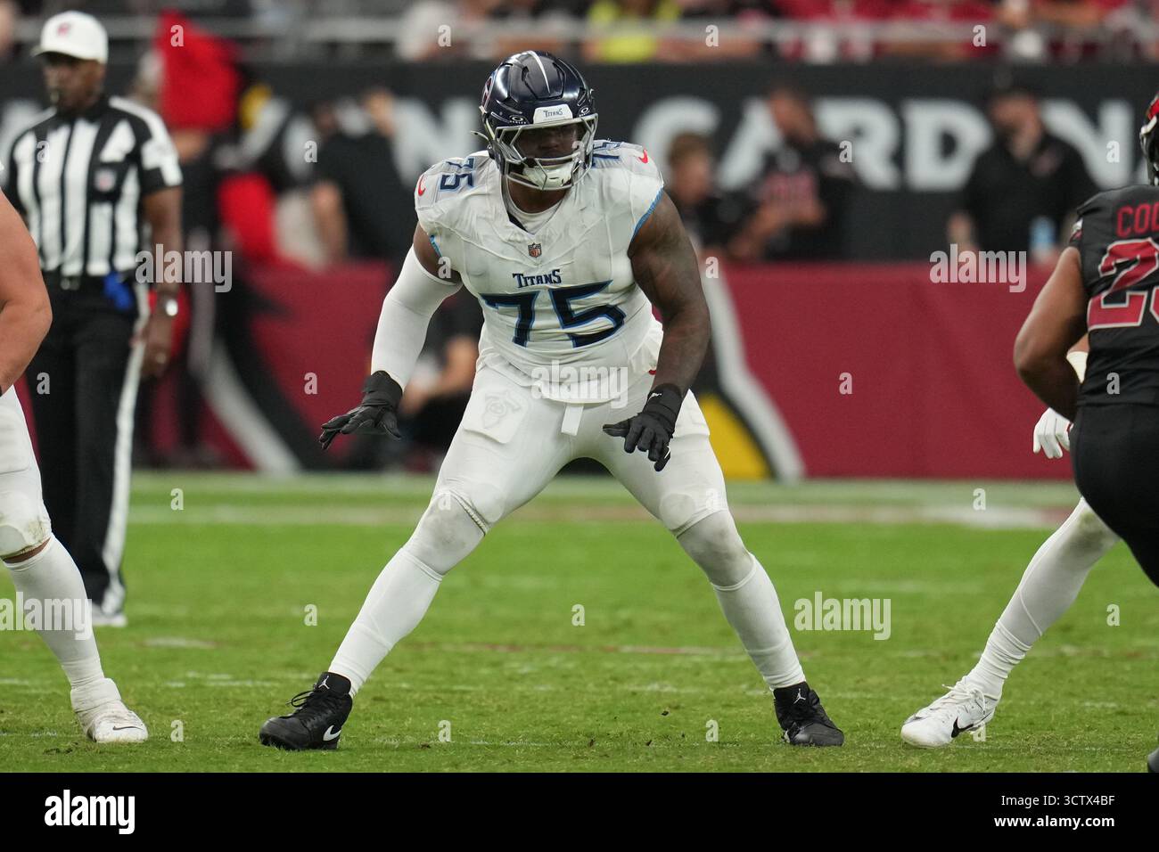 Tennessee Titans offensive tackle Dan Moore Jr. (75) blocks during an ...