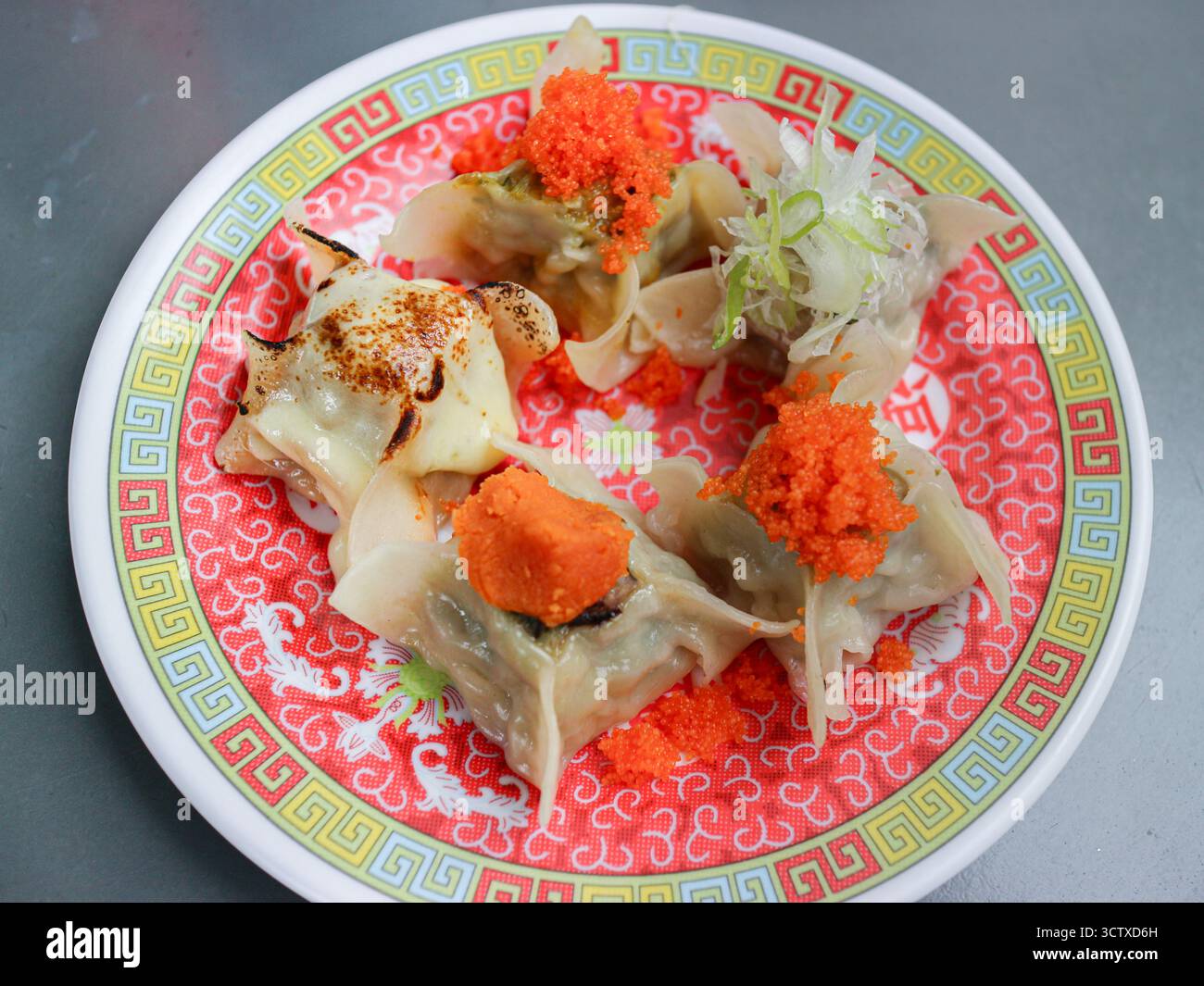 Steamed Roe Assorted Thai Dim Sum (steamed dumplings) topped with roe and Salted ...