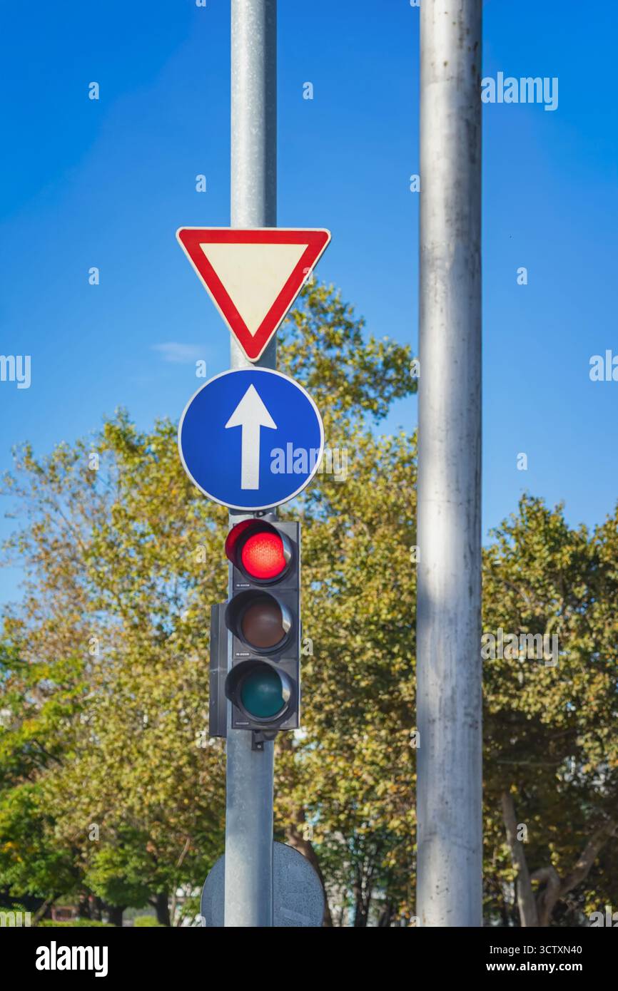 Rode Signel Traffic light with red signal and road signs street pole. Urban safety ...