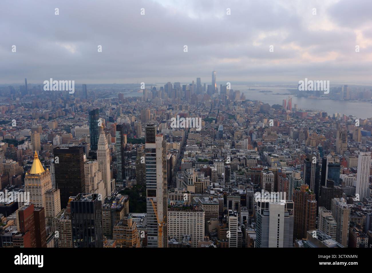 Aerial view of Midtown Manhattan towards Lower Manhattan with Hudson River on right side in a cloudy evening. New York City.USA Stock Photo