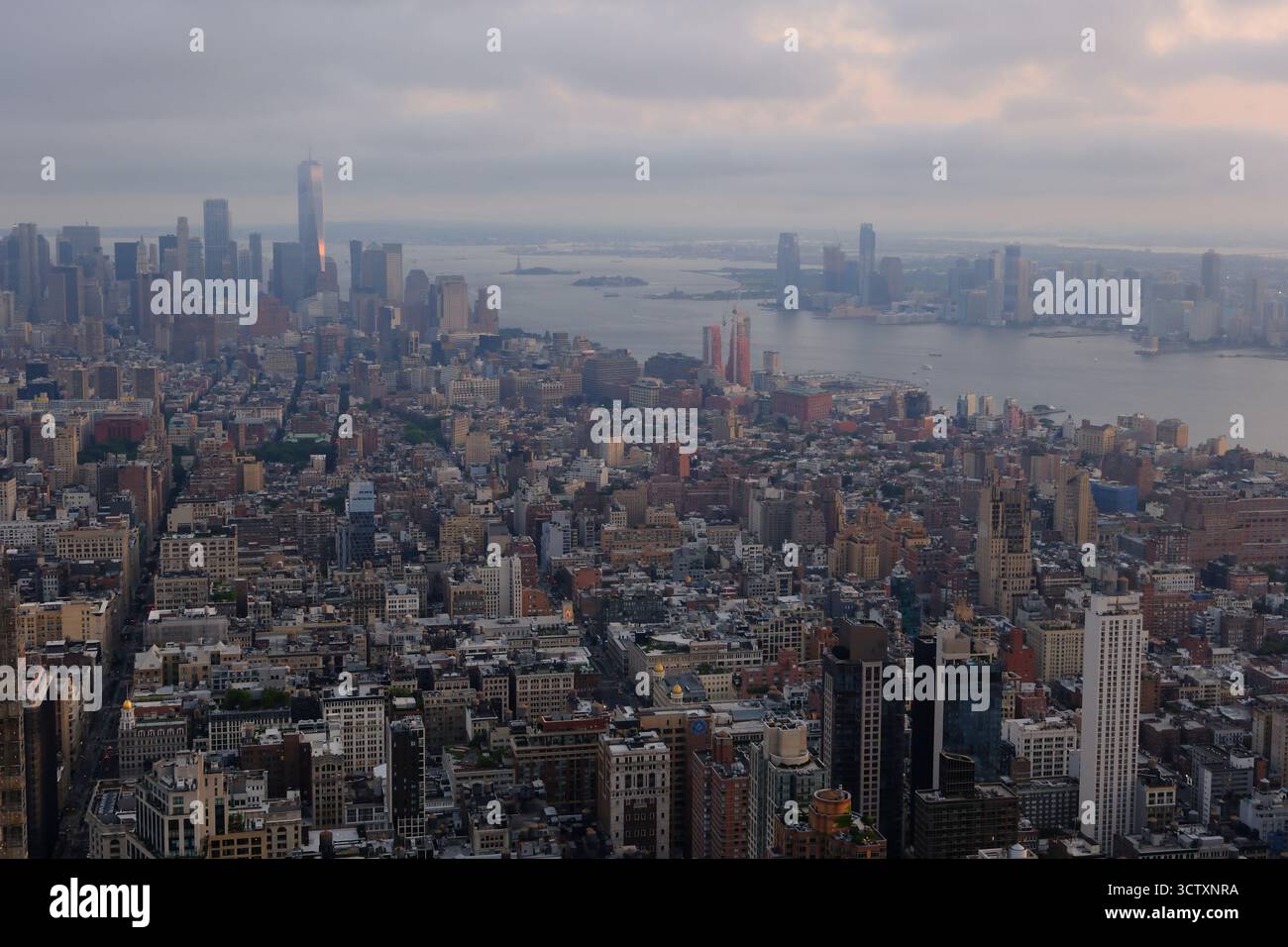 Aerial view of Midtown Manhattan towards Lower Manhattan with Hudson River on right side in a cloudy evening. New York City.USA Stock Photo