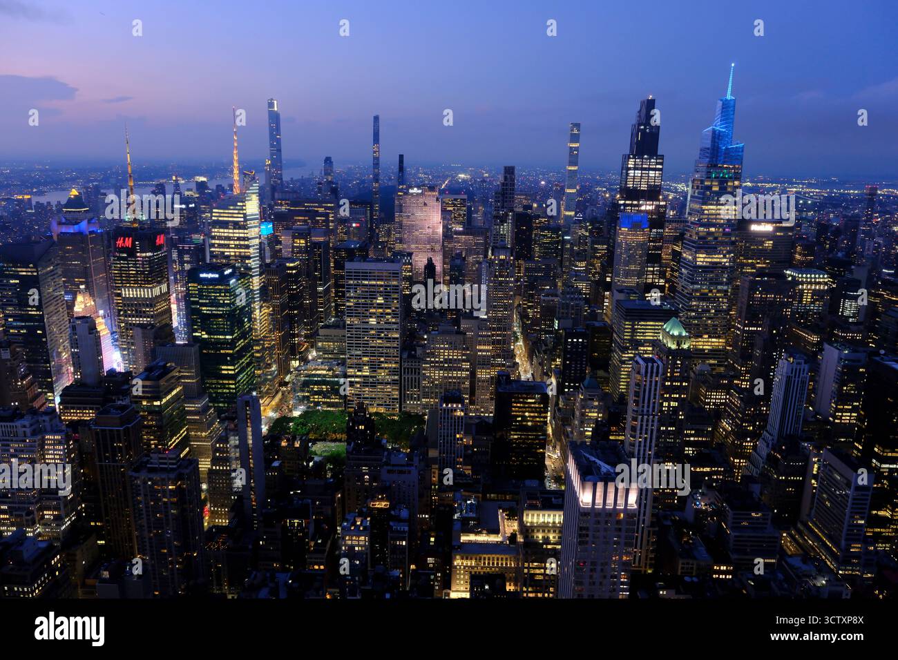 The night view of Midtown Manhattan with supertall skyscrapers looking north with the Upper Manhattan in the background.New York City.USA Stock Photo