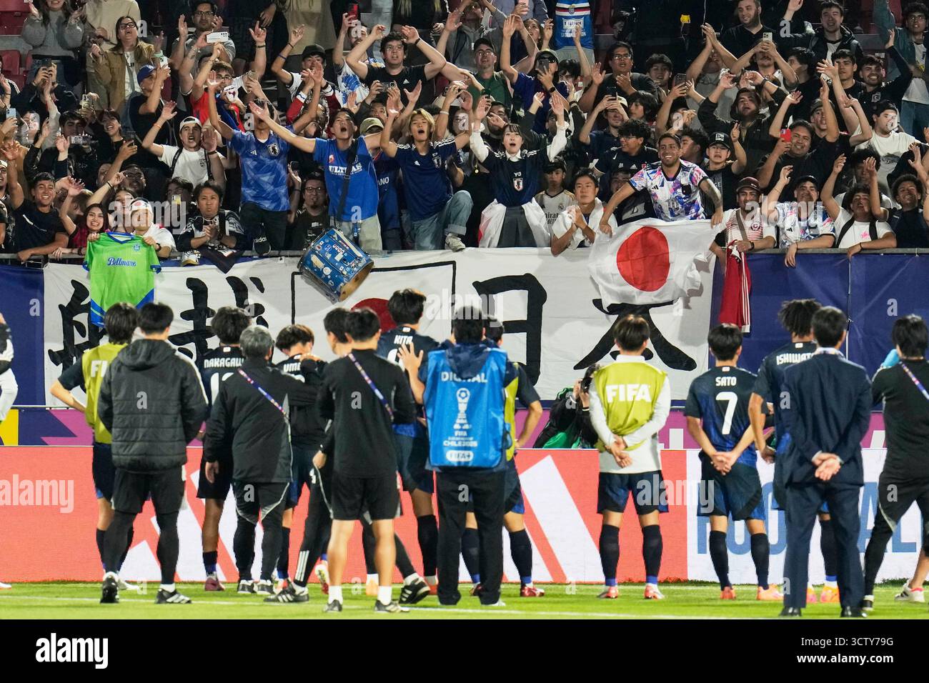Japan players stand in front of their fans after losing a FIFA U-20 ...