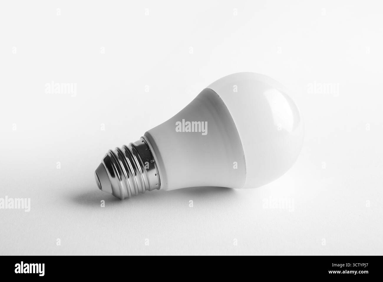 Modern light bulb on white background Stock Photo - Alamy