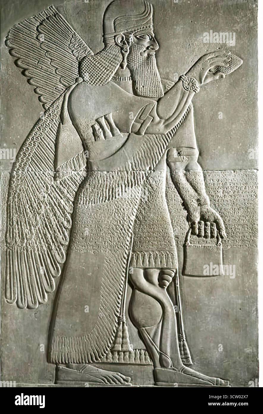 1318. WINGED PROTECTIVE SPIRIT, PALACE OF KING ASHURBANIPAL II, NIMRUD, 9TH C. B.C. Stock Photo