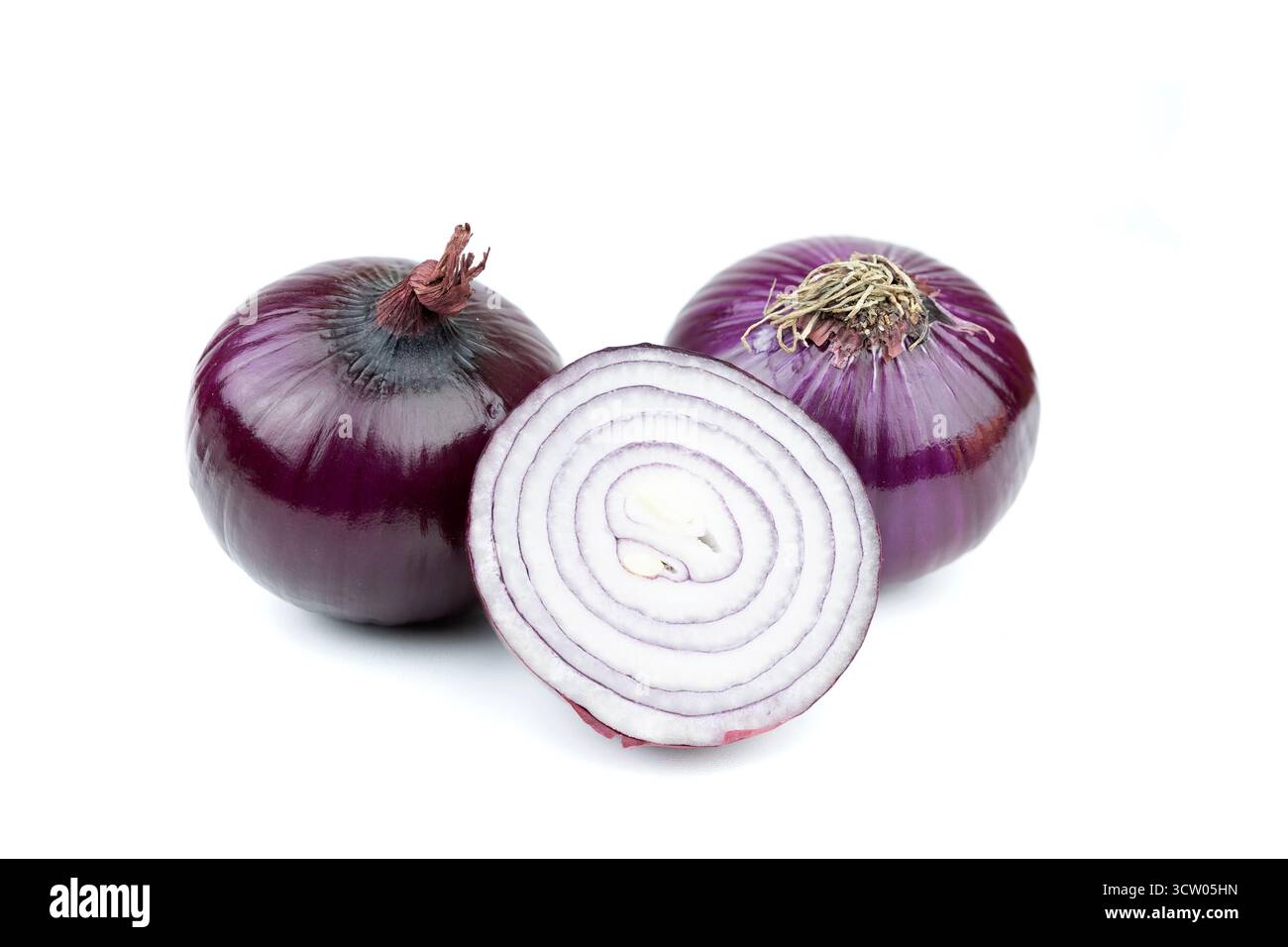 Fresh Red Onions with Sliced Half on White Background Stock Photo