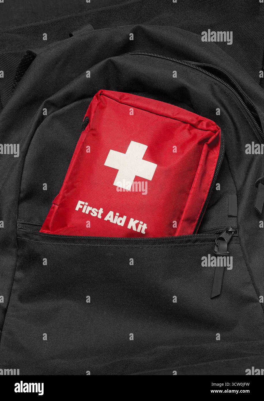 First Aid Kit on a black backpack Stock Photo