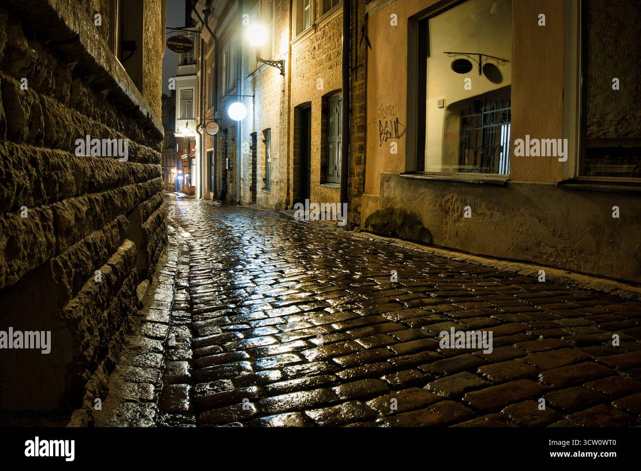 Rainy Night On A Cobblestone Street In Tallinn Old Town Stock Photo Alamy