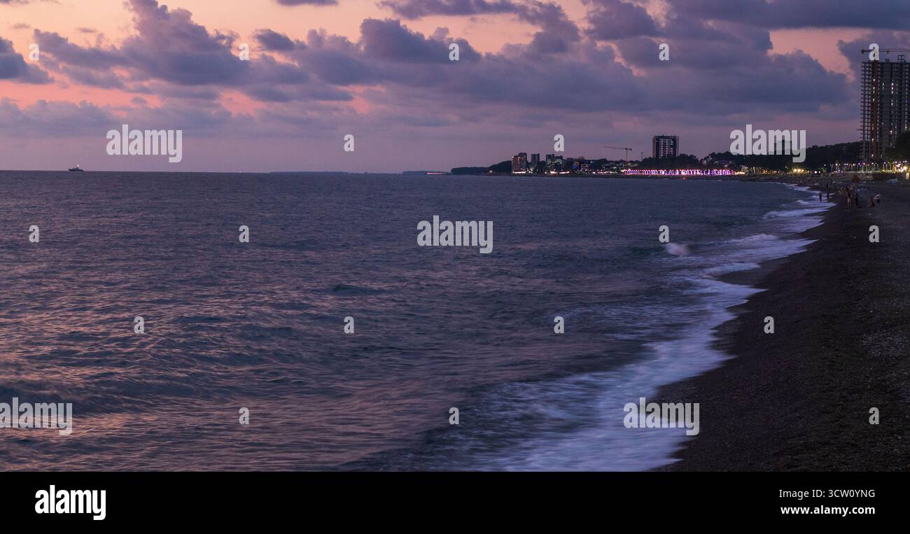 Orange sunset dramatic clouds glowing hi-res stock photography and ...