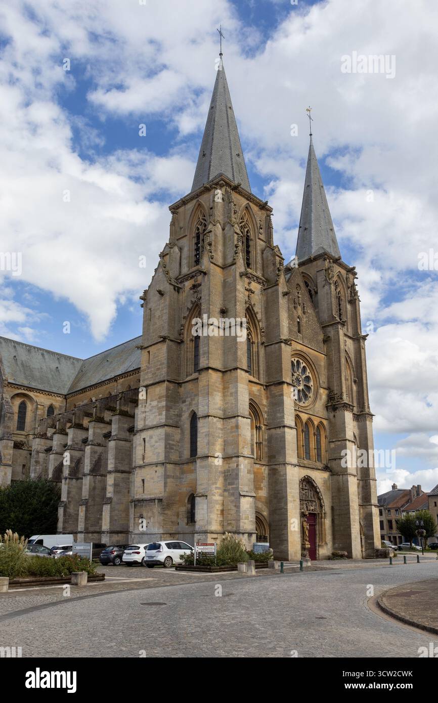 Exterior view of the abbatial church of Notre-Dame de Mouzon in the Ardennes region of France. It church is the ancient church of the monastery of Mou - Stock Image