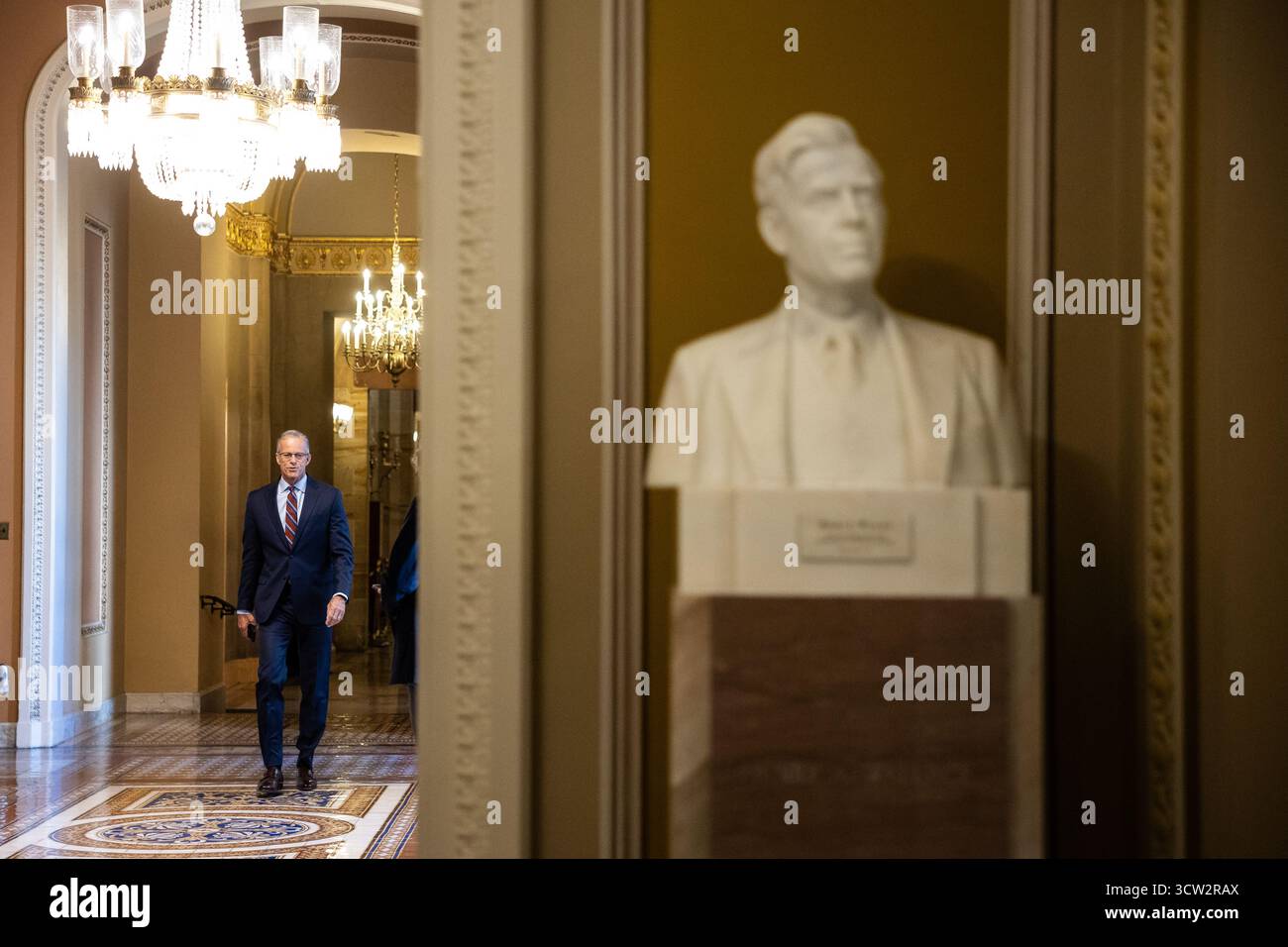 Senate Majority Leader John Thune (R-S.D.) walks to a vote at the U.S ...