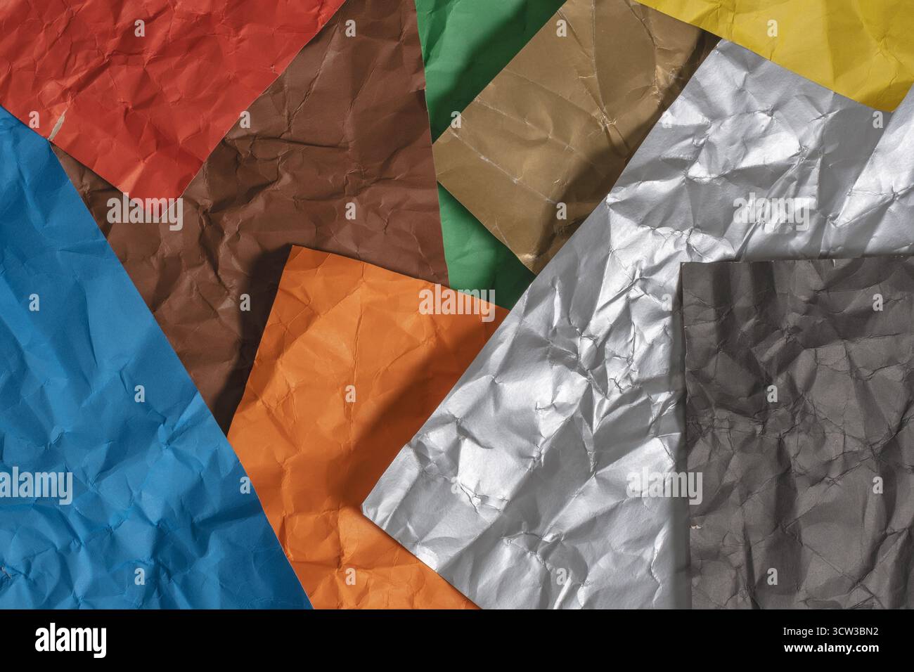 Colored crumpled paper as background. Toned image Stock Photo