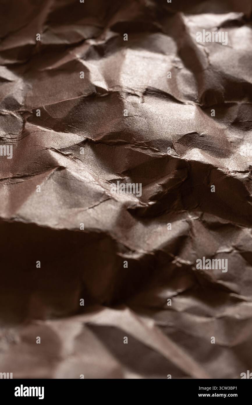 Crumpled brown paper background. Close up Stock Photo