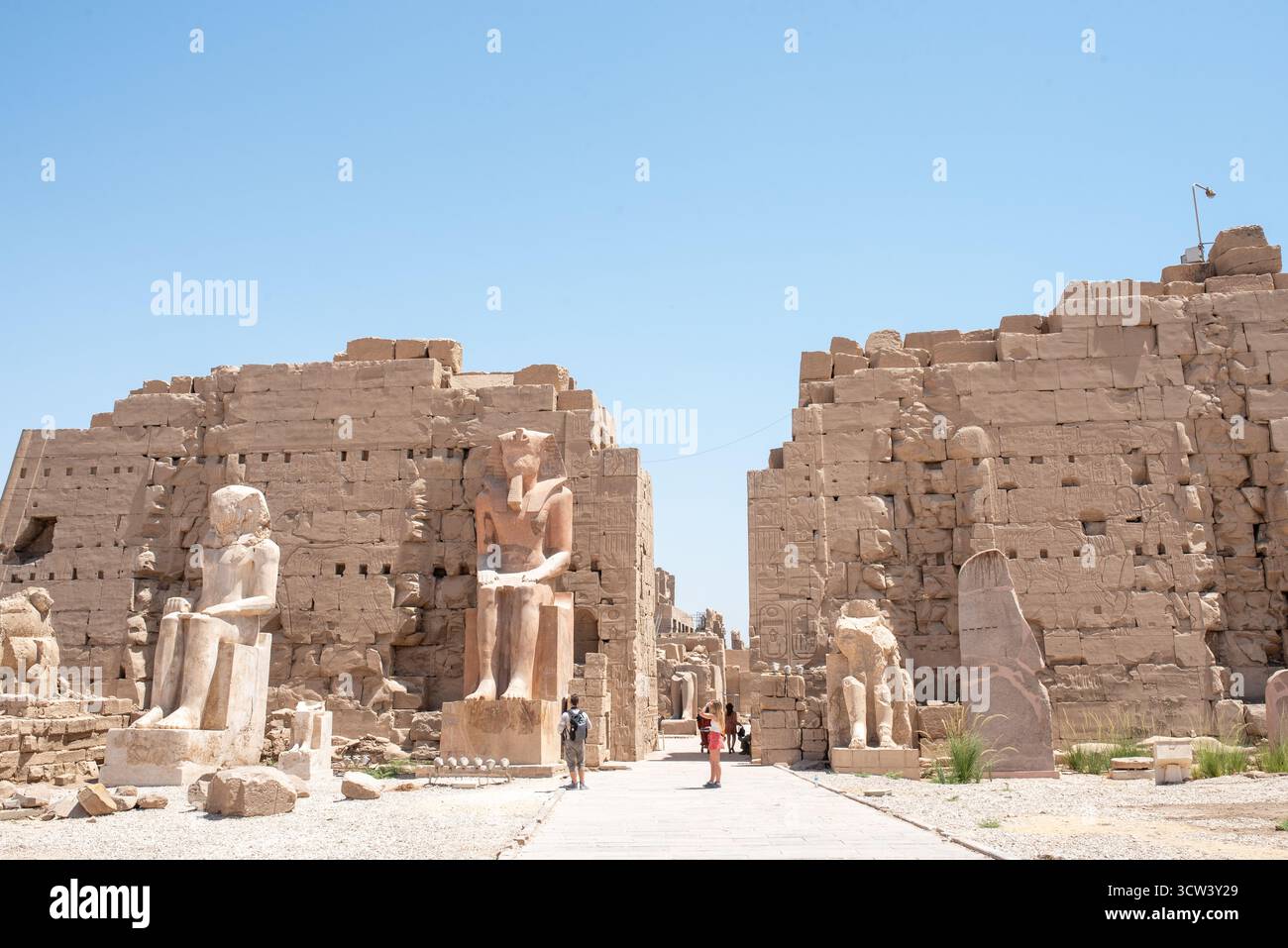 Ancient Egyptian temple with statues of pharaohs and detailed ...