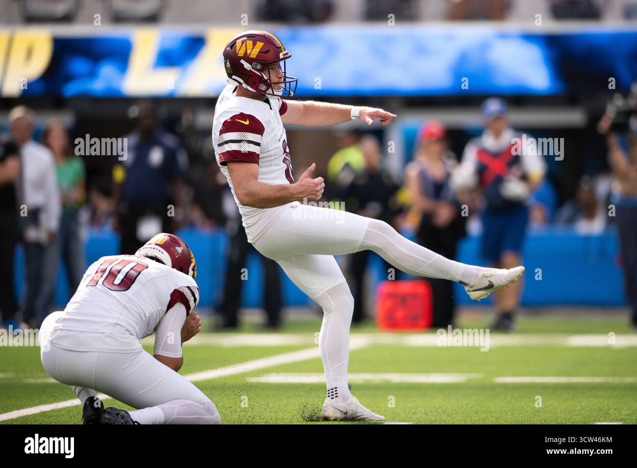 Washington Commanders kicker Matt Gay (16) kicks for a field goal ...