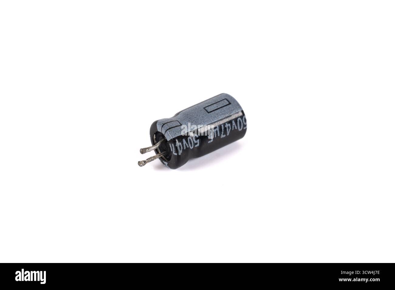 Electrolytic capacitor isolated on white background. Electronic parts concept Stock Photo