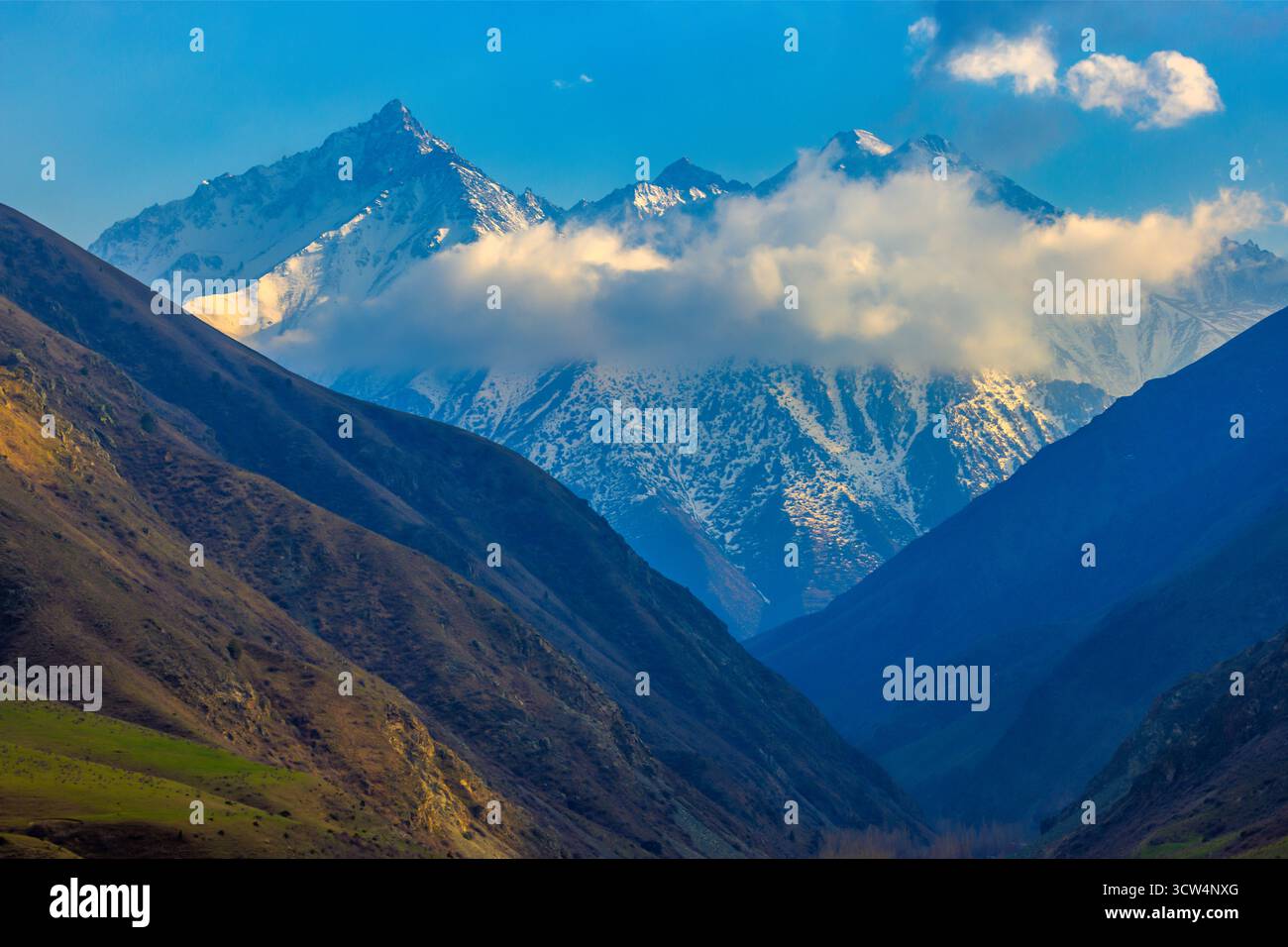 Distant snow capped mountains hi-res stock photography and images - Alamy