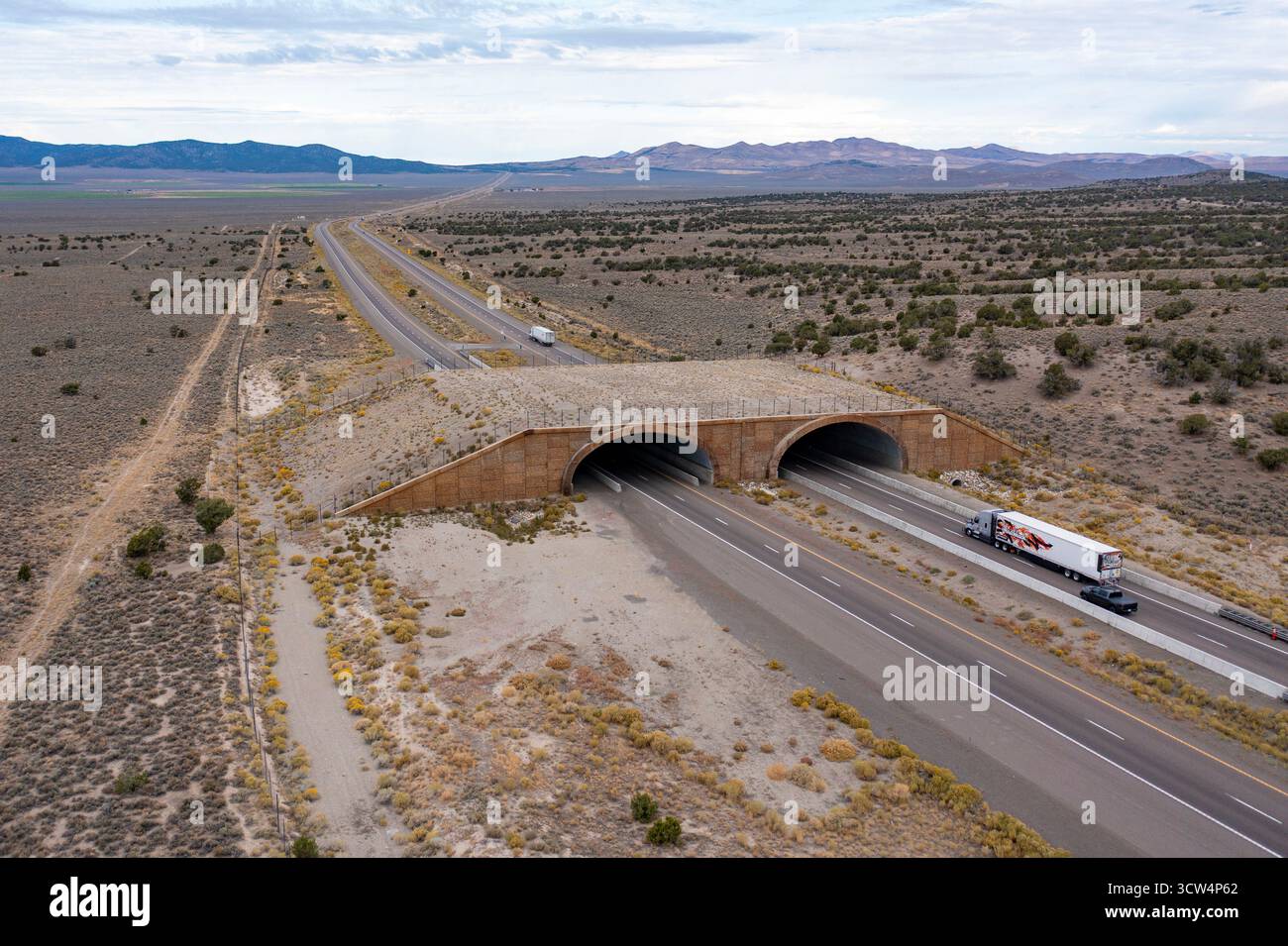 Wells, Nevada - A wildlife overpass on Interstate 80 east of Wells allows elk, deer, mountain lions and other animals to safety cross the freeway, red Stock Photo