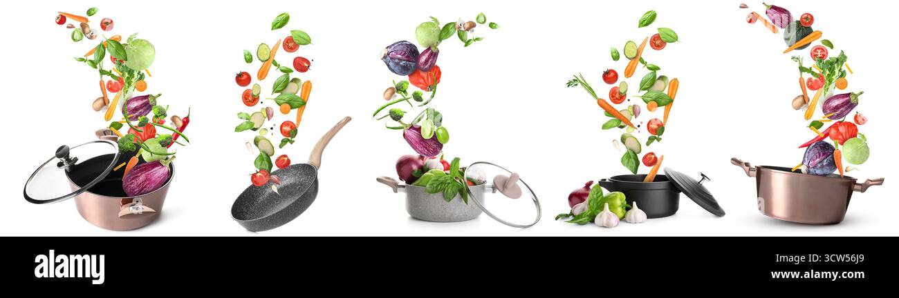 Set of kitchenware and different flying vegetables on white background Stock Photo