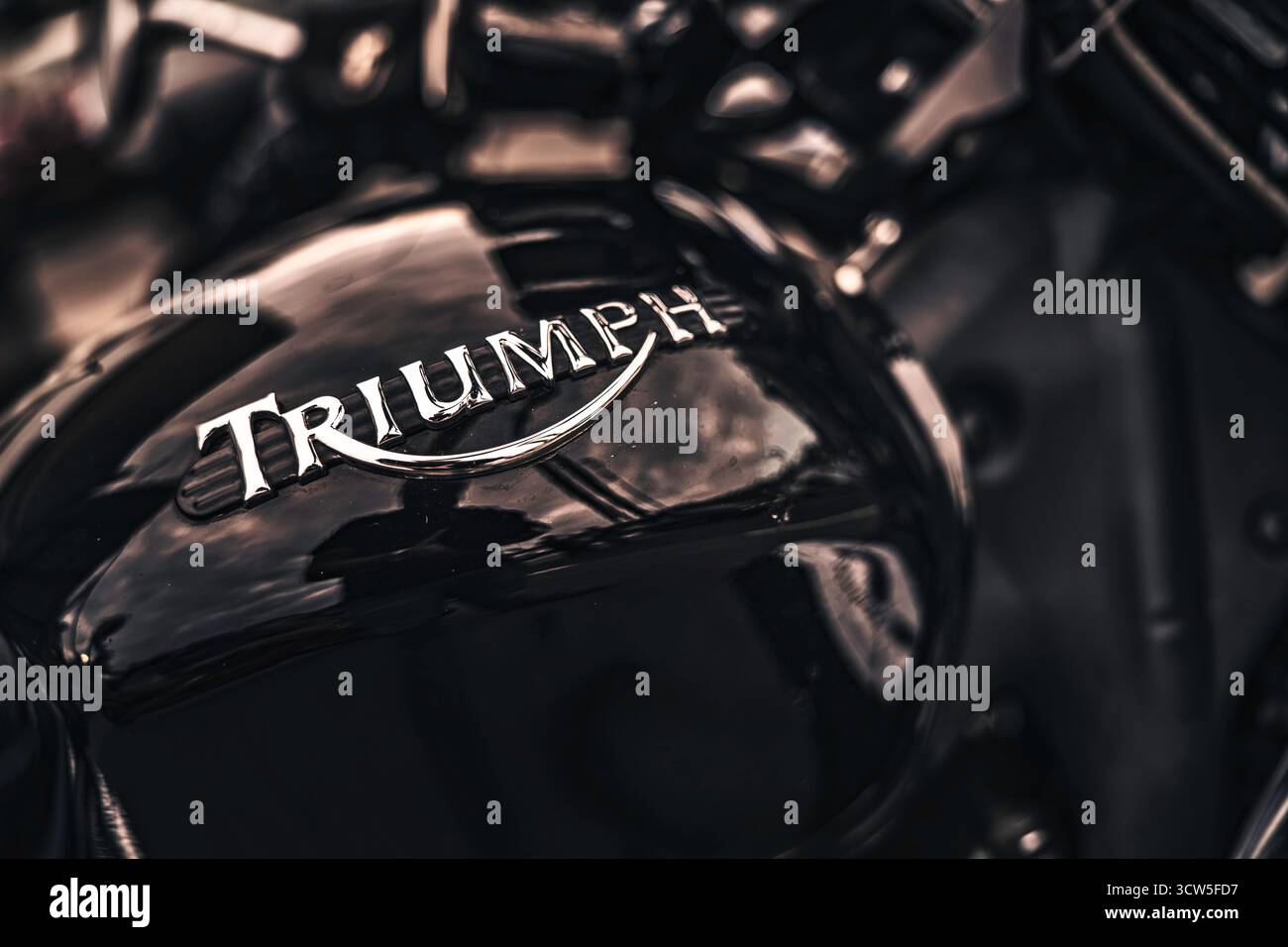 Rome, italy 10 september 2025: triumph motorcycle fuel tank with iconic ...