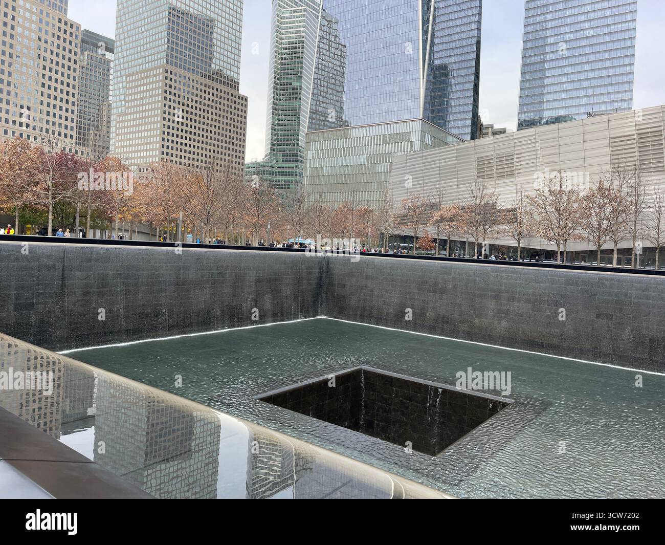 A quiet, misty morning at the September 11 Memorial — honoring those lost with stillness and reverence. - Smartphone Captured Stock Image