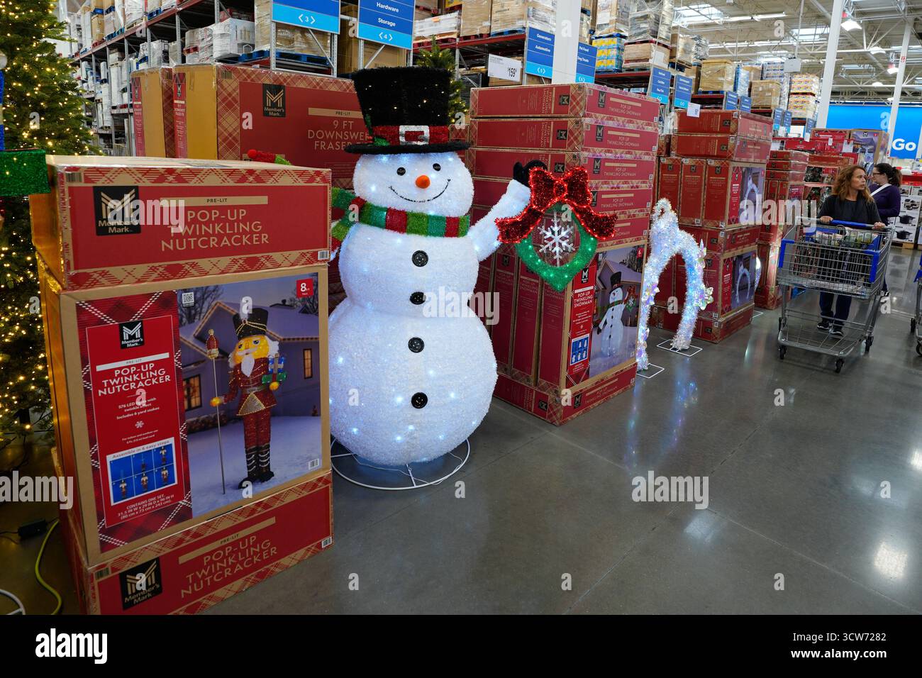 People shop among holiday displays at a Sam's Club, Wednesday, Sept. 24 ...