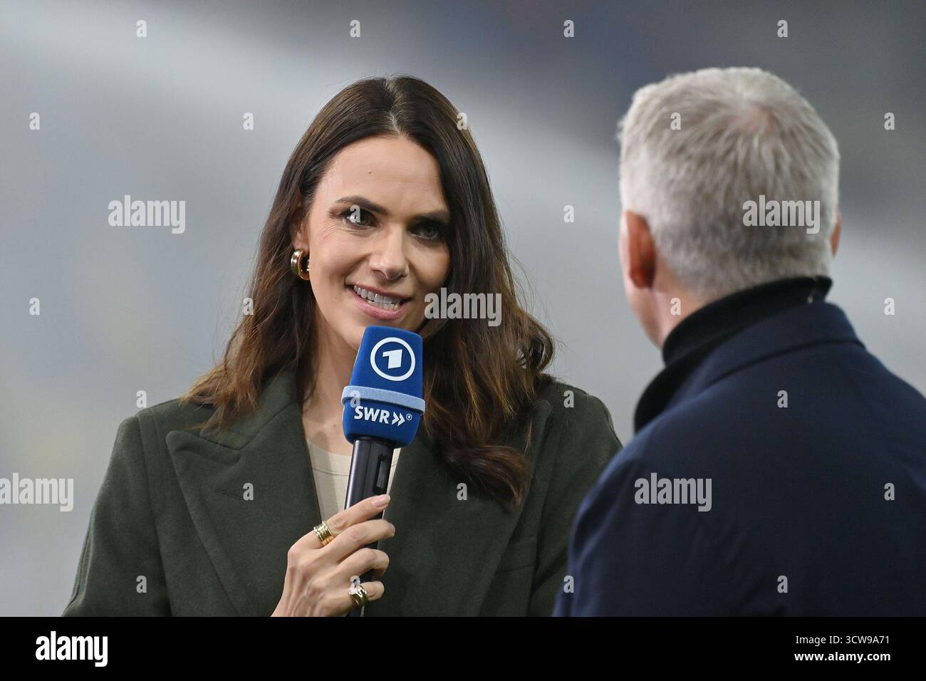 Esther SEDLACZEK (ARD presenter) and football expert Bastian ...