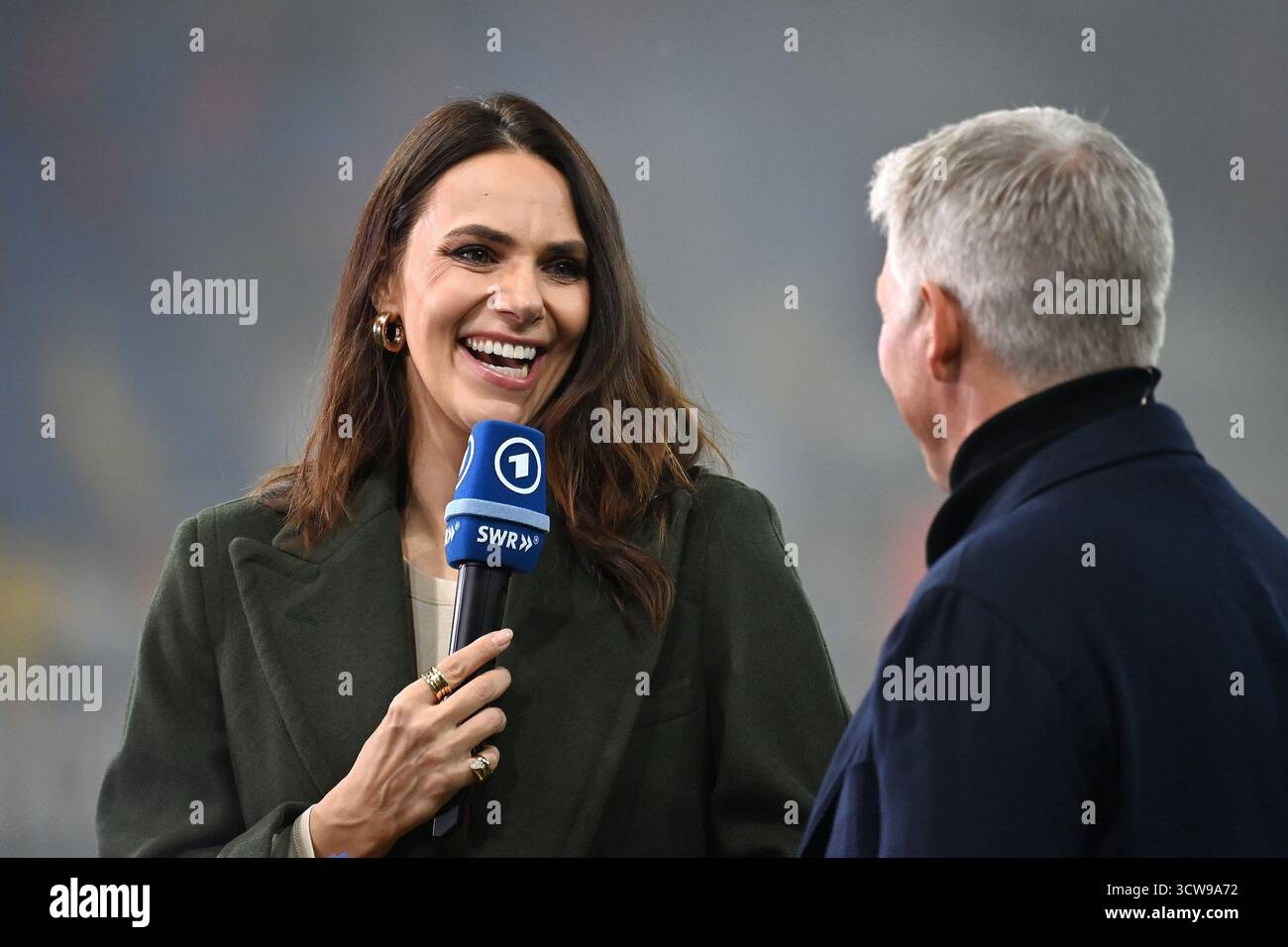 Esther SEDLACZEK (ARD presenter) and football expert Bastian ...