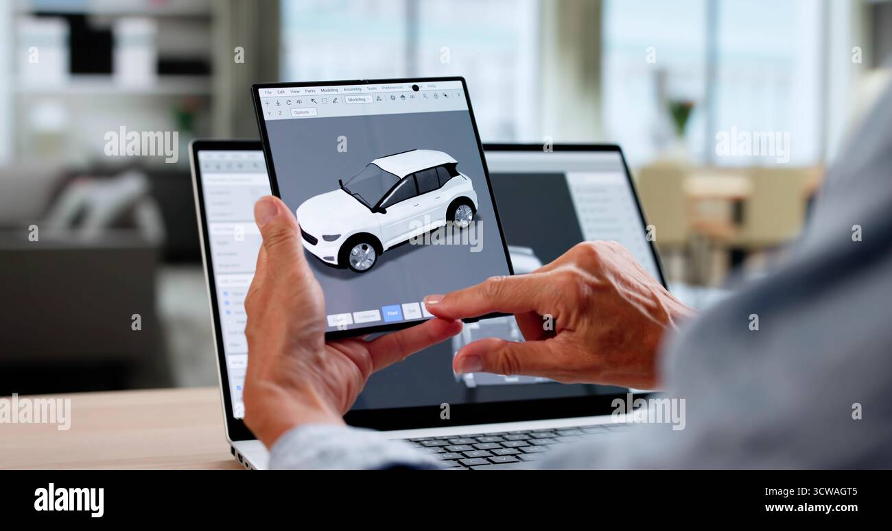 Female Engineer Using 3D CAD Software To Design EV Car Stock Photo