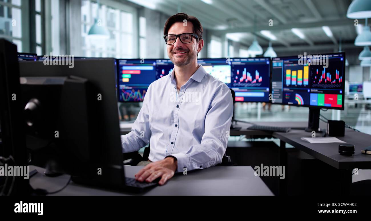 Elderly Businessman Analyzing Financial Growth On Computer Analytics Dashboard Screen. Stock Photo