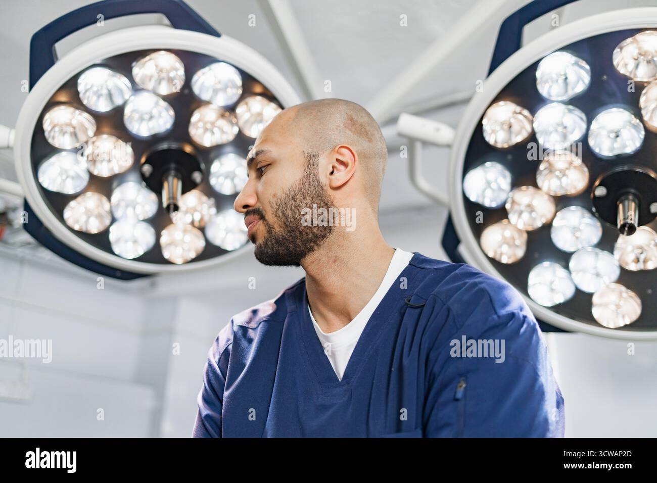 Surgeon in Operating Room Stock Photo