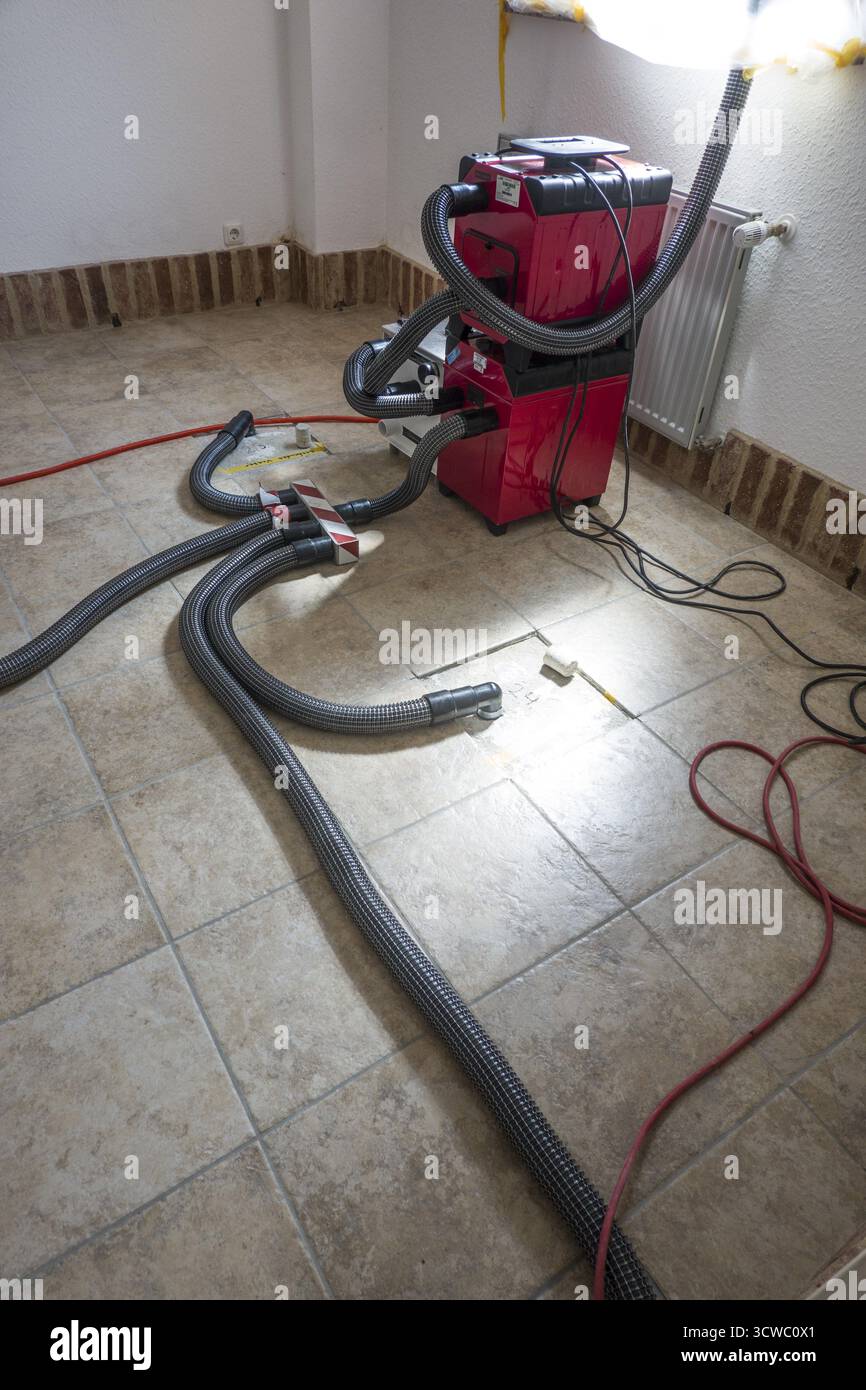 Wet screed is dried in a special process Stock Photo