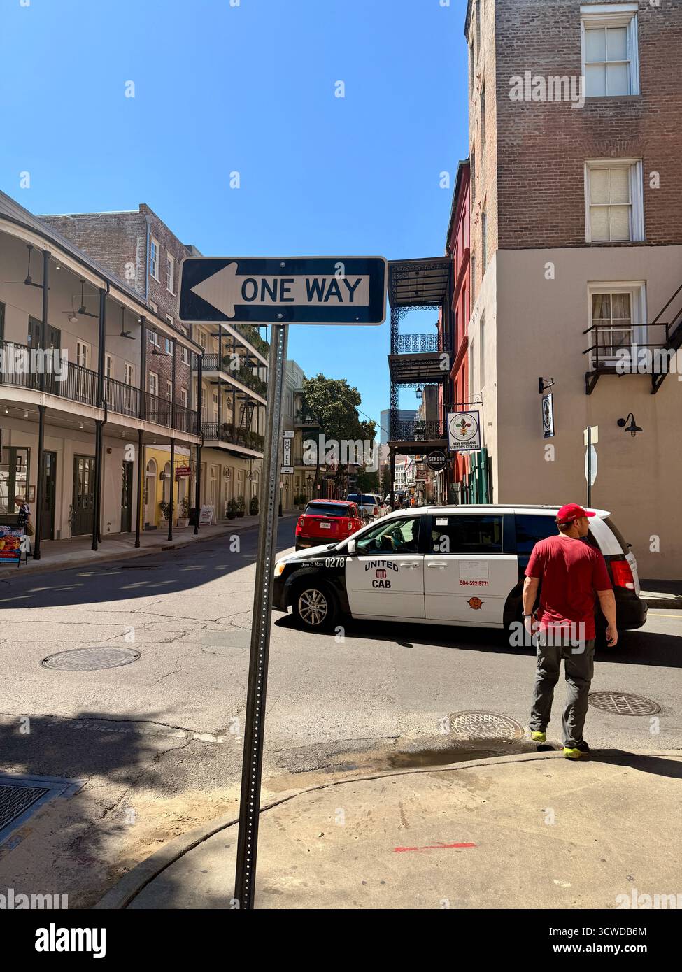 Street corner with “One Way” sign in the French Quarter, New Orleans - Smartphone Captured Stock Image