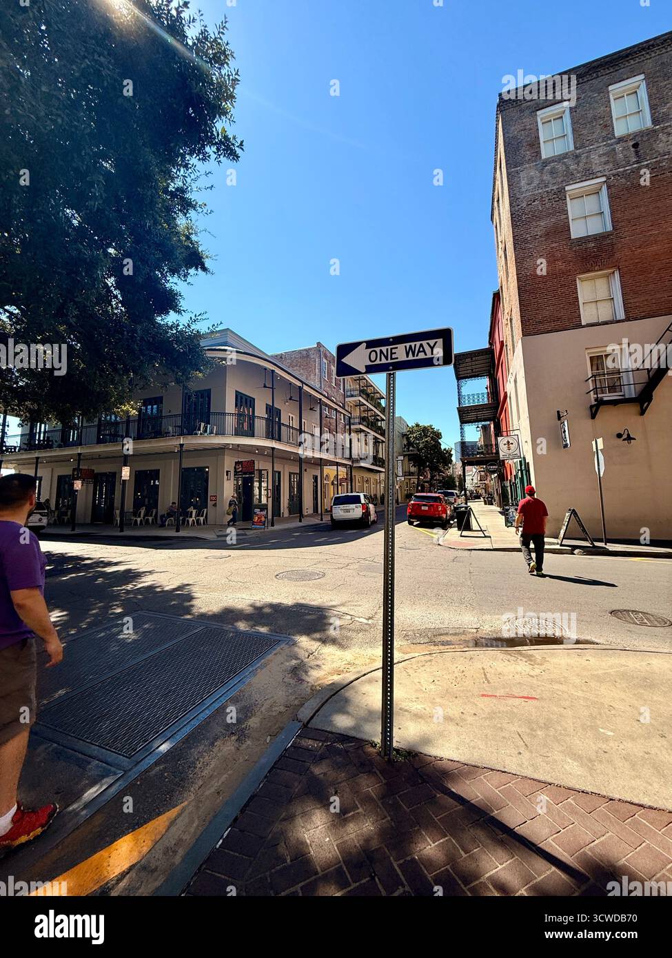 Street corner with “One Way” sign in the French Quarter, New Orleans - Smartphone Captured Stock Image