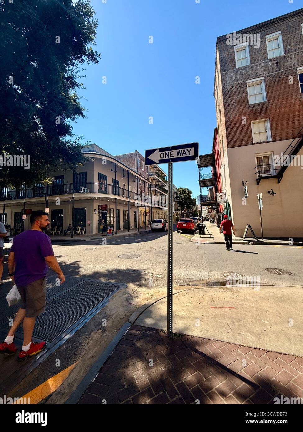 Street corner with “One Way” sign in the French Quarter, New Orleans - Smartphone Captured Stock Image