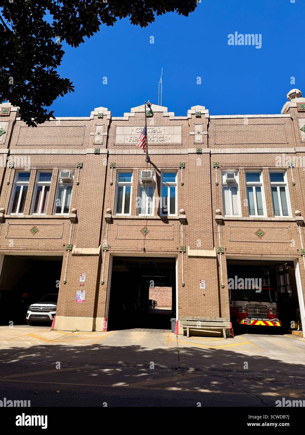 New Orleans Fire Department Station with fire truck parked inside - Smartphone Captured Stock Image