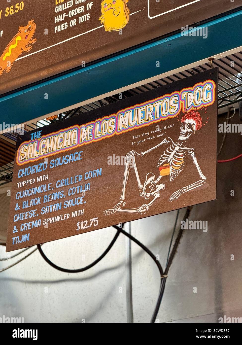 “Salchicha de los Muertos Dog” menu sign at Dat Dog restaurant, New Orleans - Smartphone Captured Stock Image