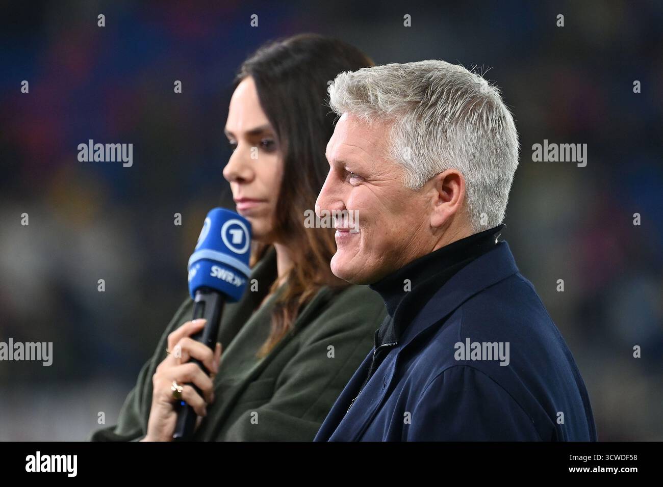 Esther SEDLACZEK (ARD presenter) and football expert Bastian ...