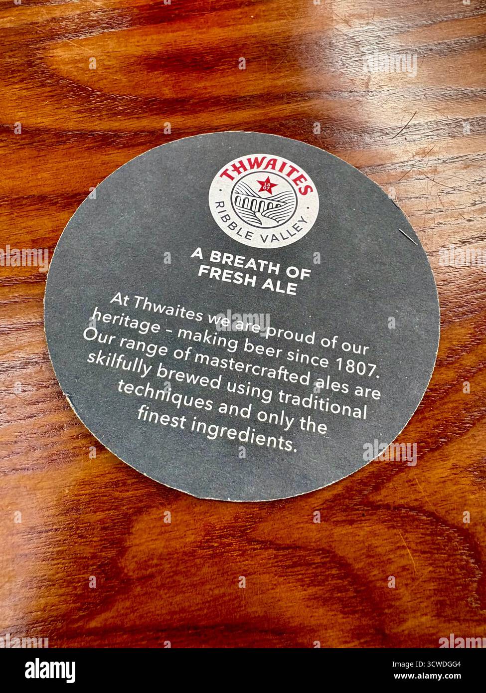 Thwaites beer mats in a pub restaurant in Ramsbottom, Greater Manchester - Smartphone Captured Stock Image
