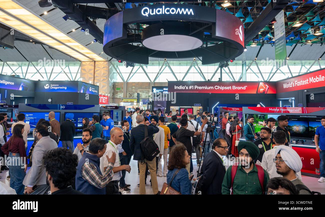 A crowd of visitors at the Qualcomm ( Qualcomm is an American tech ...