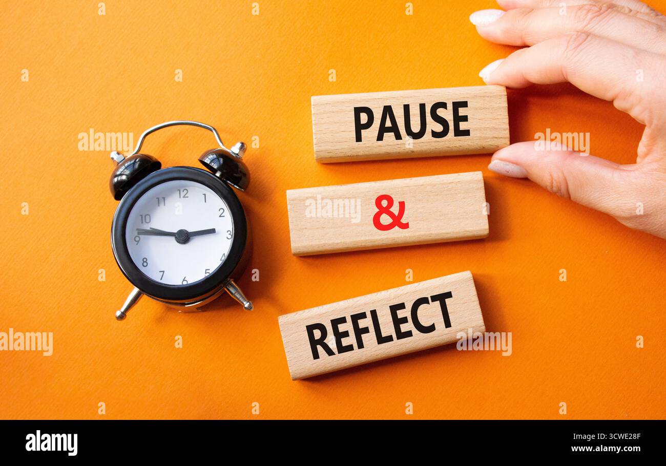 Pause and Reflect symbol. Concept words Pause and Reflect on wooden ...