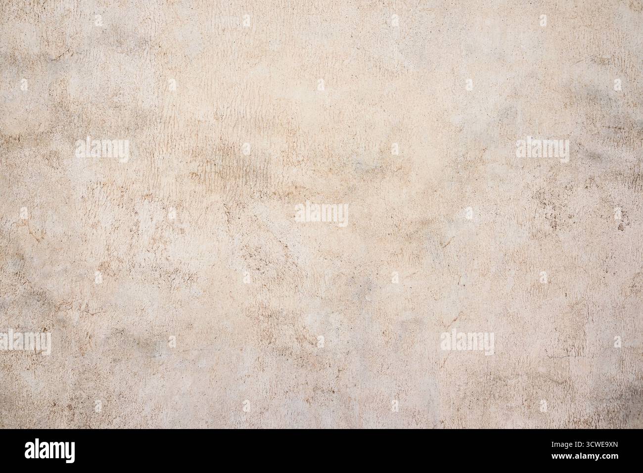 Neutral abstract background. Light beige texture of old plastered surface. Stock Photo